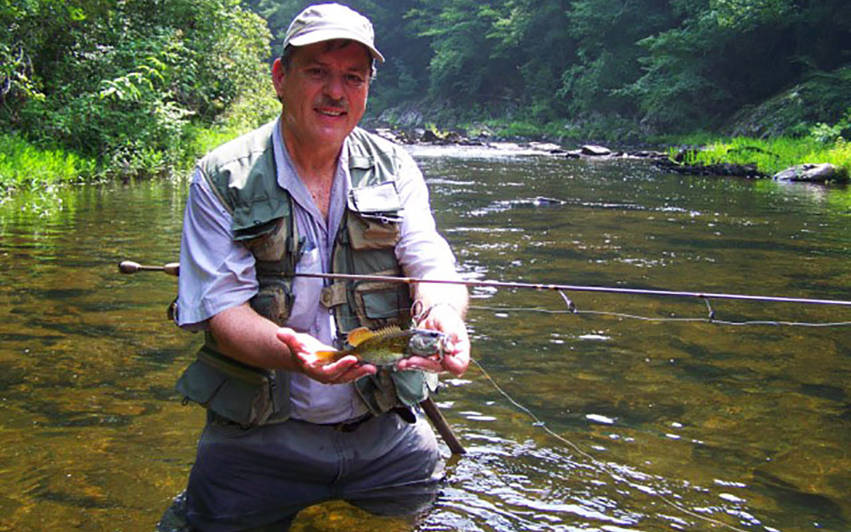 Wade Bourne wading the Conasauga River