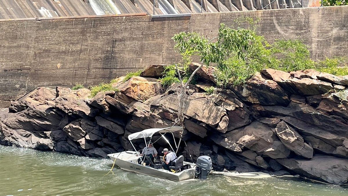 officers searching for drowned fisherman